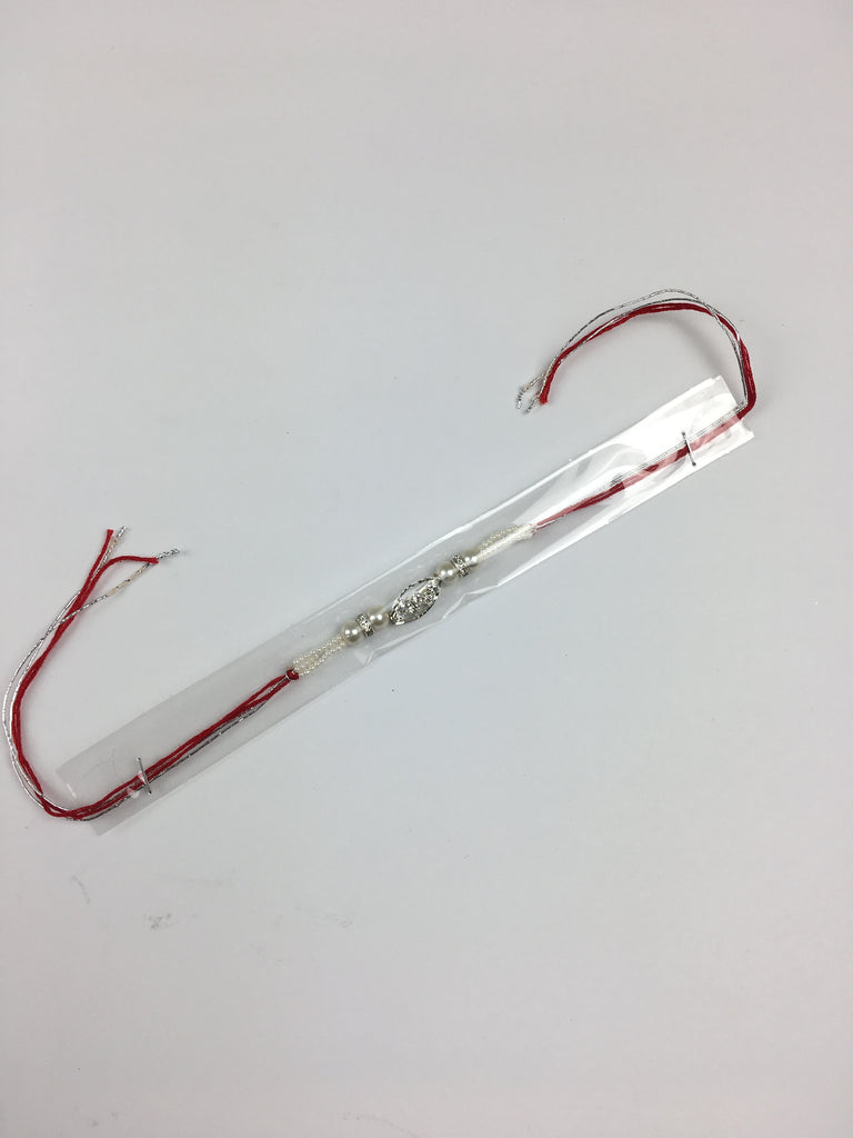 Single Silver Diamonte Oval Shaped Rakhi With Red Thread - R127