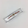 Single Red Thread Gold Cross Shaped Rakhi With Pearls -R106