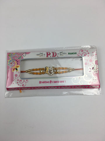 Single Disc Shaped Rakhi With Diamonte Stoning And Pearls - R125